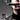 Närbild av kvinna som röker cigarr med spetsdetaljer på krage — La Fumée Royale (s)