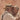 Close-up of two elderly men dancing cheek to cheek, eyes closed. Terracotta Tango