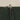 Close-up of a man in a cap trimming a tall hedge from a ladder. Verdant Vertigo