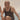Close-up of an elderly man in a black bathing costume holding someone's hand mid-jump. Salt & Bravado
