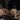Close-up of hands with gold rings and lace cuffs, resting on the armour. Velvet Vanity Hour