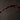 Close-up of red wine splashing out of a glass into the air. The Unrepentant Pour